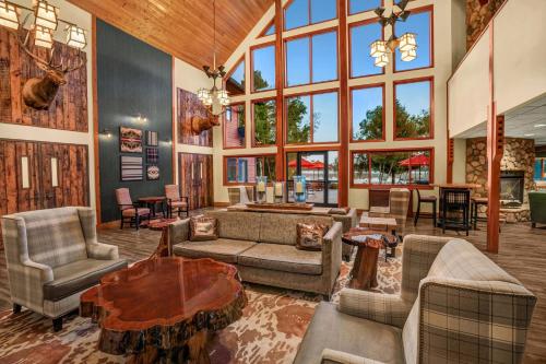 a large living room with a large window at Holiday Inn Express & Suites Hayward by IHG in Hayward