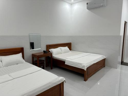 Una cama o camas en una habitación de Hotel AN 52