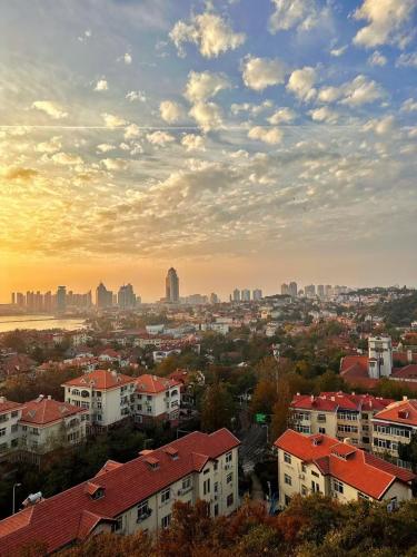 a view of a city with houses and buildings at September Republic of China Residence in Qingdao in Qingdao