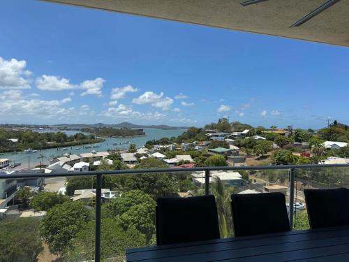 a view of a harbor from a balcony at Stunning Sub Penthouse in Gladstone