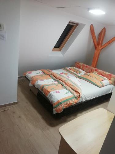 Кровать или кровати в номере ASTA LA VISTA Vendégház