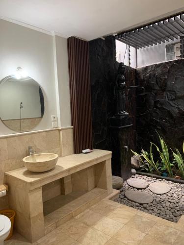 Bagno di Three Brothers Bungalows & Villas
