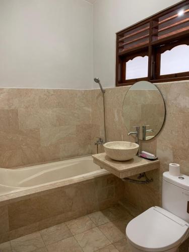 Bagno di Three Brothers Bungalows & Villas