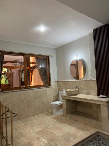 Bagno di Three Brothers Bungalows & Villas