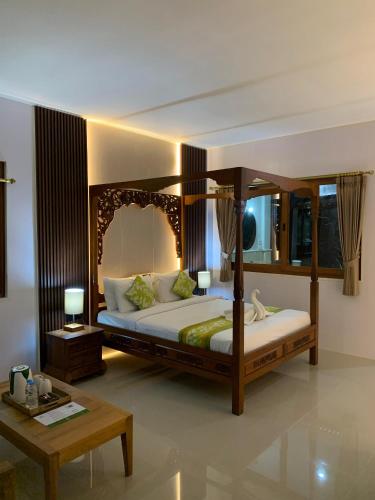Letto o letti in una camera di Three Brothers Bungalows & Villas