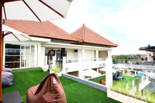 Κήπος έξω από το GM Guest House Canggu