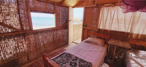 Ένα ή περισσότερα κρεβάτια σε δωμάτιο στο ACACIA Camp
