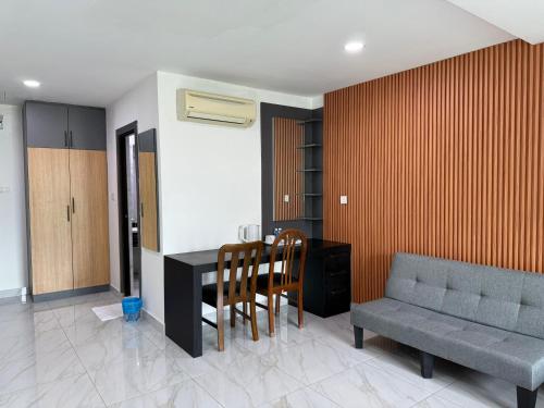 Un lugar para sentarse en Prime Suite at Ampang - Individual Private Rooms