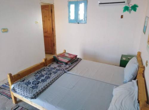 Ένα ή περισσότερα κρεβάτια σε δωμάτιο στο ACACIA Camp