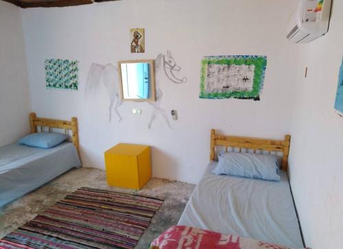 Ένα ή περισσότερα κρεβάτια σε δωμάτιο στο ACACIA Camp