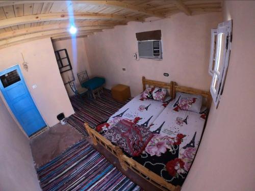 Ένα ή περισσότερα κρεβάτια σε δωμάτιο στο ACACIA Camp