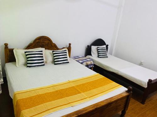 Ένα ή περισσότερα κρεβάτια σε δωμάτιο στο Lake View Nature Home