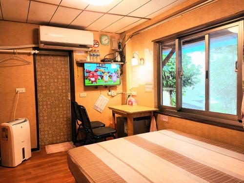 TV a/nebo společenská místnost v ubytování Yun Cheng Homestay