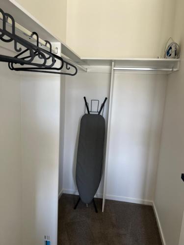 a room with a punching bag in the corner of a room at Stay in Tarneit West Melbourne in Tarneit