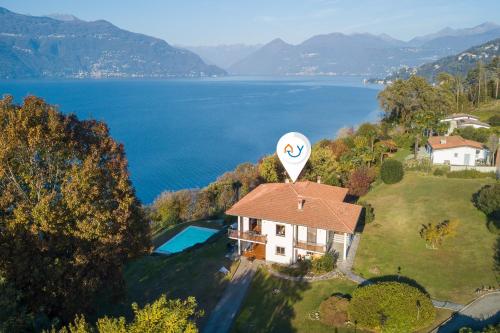 an aerial view of a house with a hot air balloon at Casa Antonia - Happy Rentals in Porto Valtravaglia