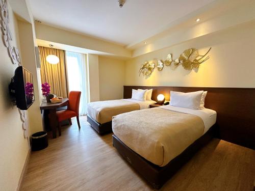 Katil atau katil-katil dalam bilik di Atanaya Kuta Bali