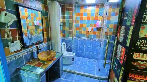 Ένα μπάνιο στο Qiannuo Youth Hostel