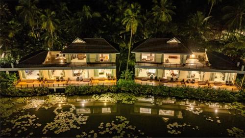 an aerial view of a resort at night at Sterling Palavelli Godavari in Rāzole