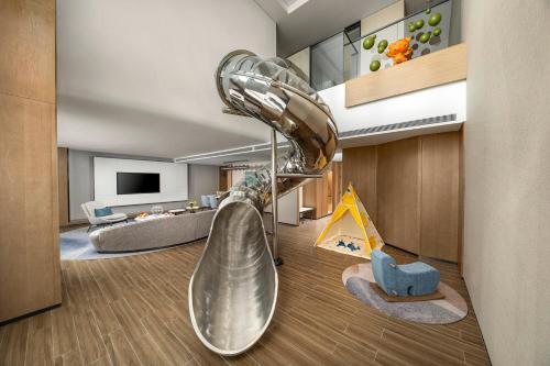 Postel nebo postele na pokoji v ubytování Crowne Plaza Sanya Yazhou Bay by IHG