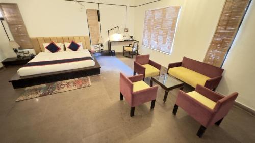 Ένα ή περισσότερα κρεβάτια σε δωμάτιο στο Spree Maati Jungle Resort