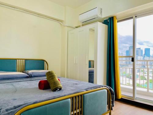 Llit o llits en una habitació de Fairlane Residences