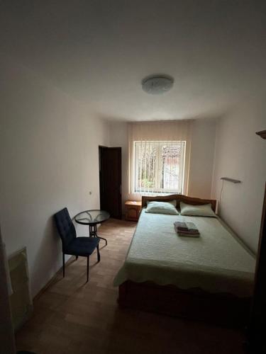 En eller flere senge i et værelse på Casa Rosa