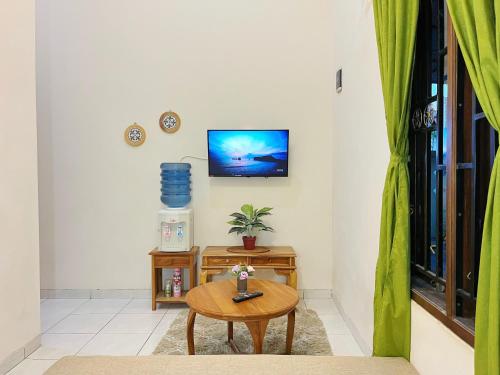 Μια τηλεόραση ή/και κέντρο ψυχαγωγίας στο Boho Hideaway