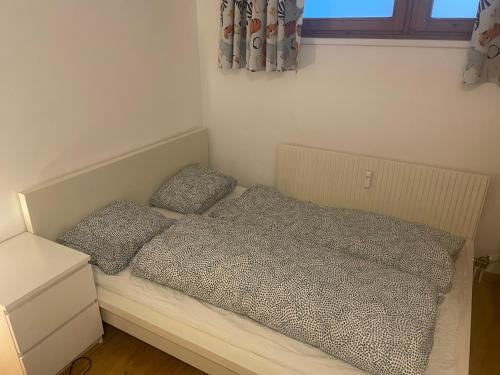 Postel nebo postele na pokoji v ubytování Traunsee Apartment 60 m2