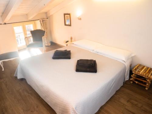 A bed or beds in a room at Maison Tatà