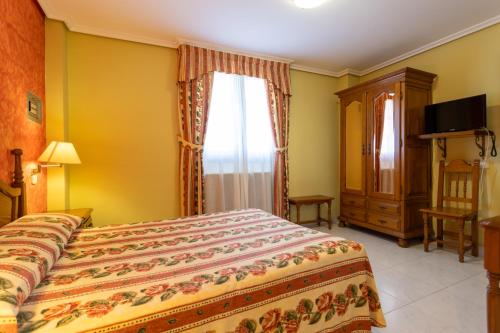 Postel nebo postele na pokoji v ubytování Hotel La Casona de Luis