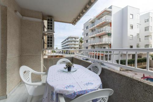 a balcony with a table and chairs on a balcony at Azul in Daimuz