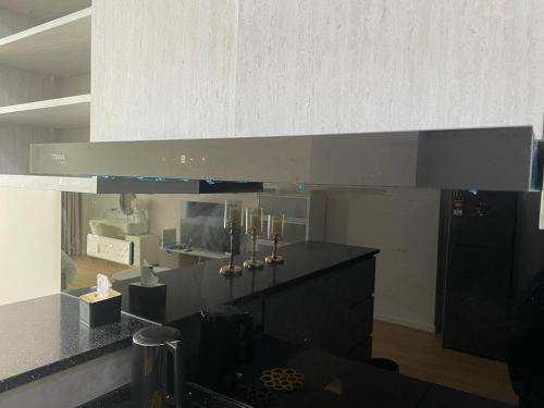 Η κουζίνα ή μικρή κουζίνα στο KO-Z Place Aru Suites