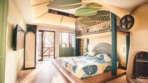 Ένα ή περισσότερα κρεβάτια σε δωμάτιο στο Sun Island Resorts, Shanghai