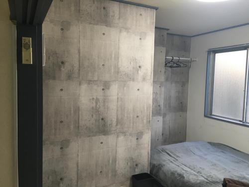 Cama o camas de una habitación en 2F female and lover of man and woman only room in Ueno