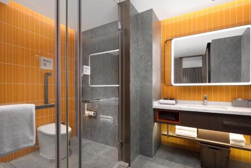 Vannituba majutusasutuses Home2 Suite by Hilton Chongqing Wanzhou