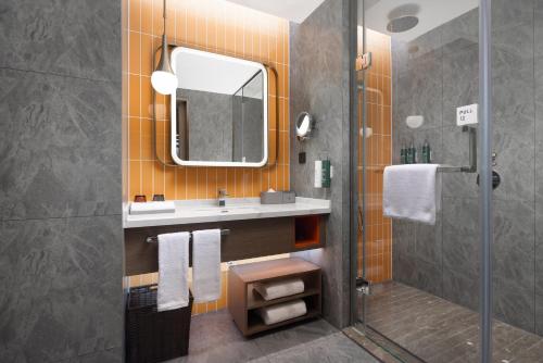 Koupelna v ubytování Home2 Suite by Hilton Chengdu Pengzhou
