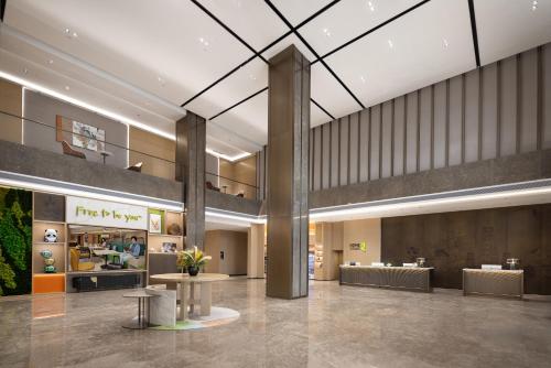 Posezení v ubytování Home2 Suite by Hilton Chengdu Pengzhou