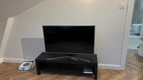 Le Cœur de la Ville的电视和/或娱乐中心