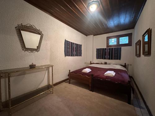 Katil atau katil-katil dalam bilik di Pine Lodge by Ski Alure