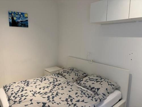 Posteľ alebo postele v izbe v ubytovaní Cozy stay in city center