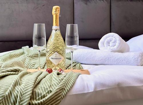 Postel nebo postele na pokoji v ubytování Residence Barrique Valtice - private wellness