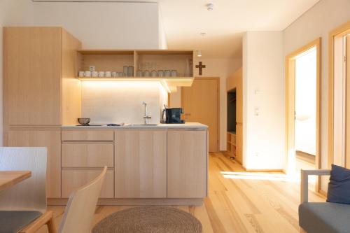 a kitchen with a sink and a counter at Forsthaus Apartments - Die Ruheoase nahe Klaffer in Klaffer am Hochficht