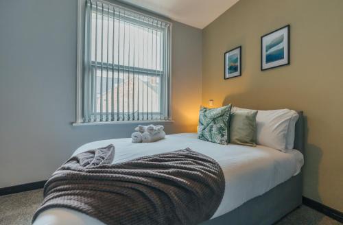 Postel nebo postele na pokoji v ubytování 8 Bed House For Contract Workers