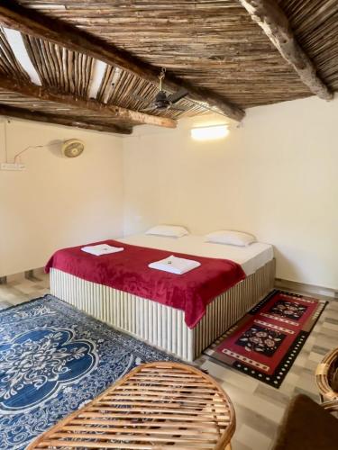 Ένα ή περισσότερα κρεβάτια σε δωμάτιο στο Tribal Wood Resort