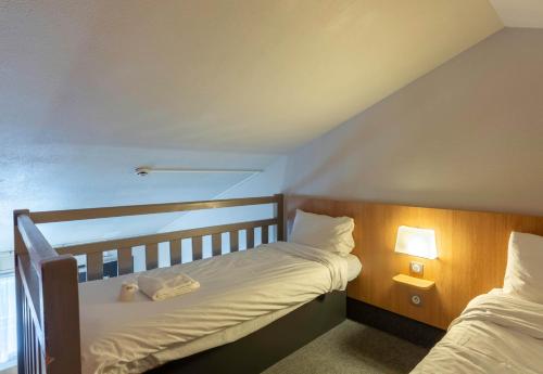 Postel nebo postele na pokoji v ubytování B&B HOTEL Amiens
