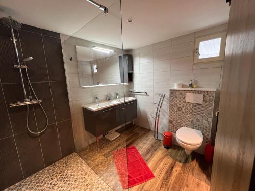 Ένα μπάνιο στο Appartement le Pas Sage du Marché La Flotte