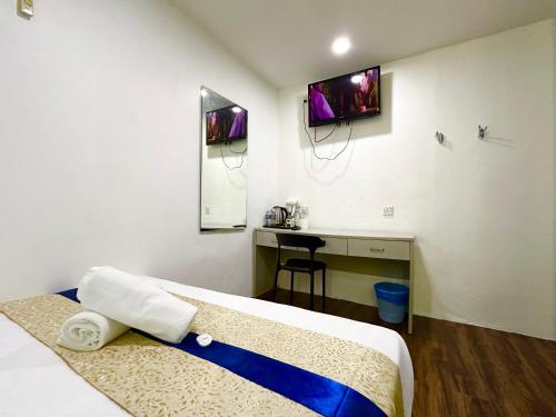 Ένα ή περισσότερα κρεβάτια σε δωμάτιο στο Park Hotel