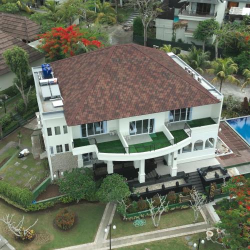 an overhead view of a house with a roof at Flamingo Aquila in Badung