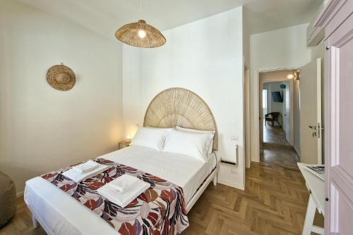 Katil atau katil-katil dalam bilik di Pola Rooms - Guesthouse by Host Hero