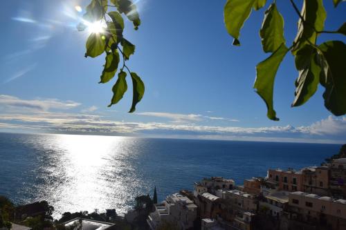 a view of the ocean from a city at La Bizantina Luxury Villa in Positano